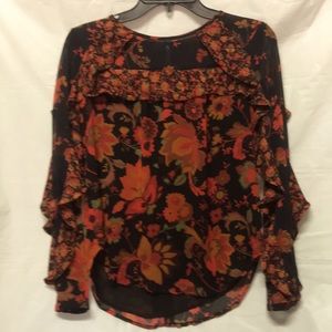 Women’s flowy blouse with black screen print.